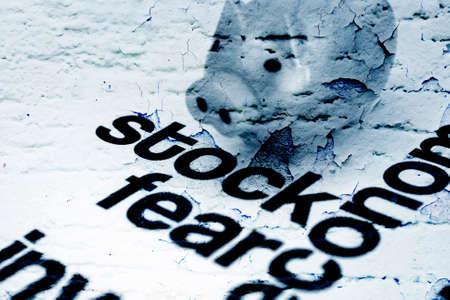 Stock and fear concept on grunge backgroundの写真素材