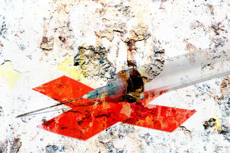 Syringe and red crossの写真素材