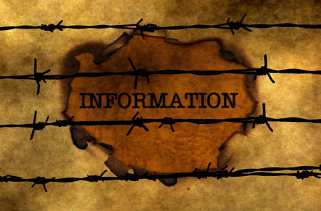 Information concept against barbwireの写真素材