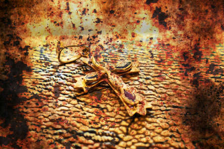 Metal golden cross grunge conceptの写真素材