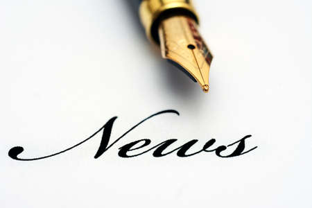News text and fountain penの写真素材