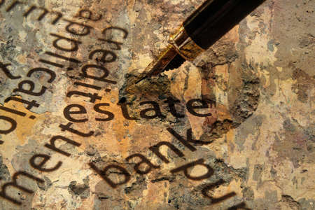 Fountain pen on estate and bank conceptの写真素材