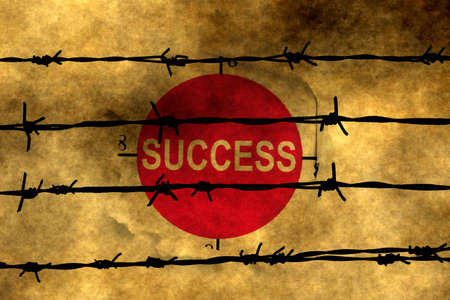 Success concept against barbwire