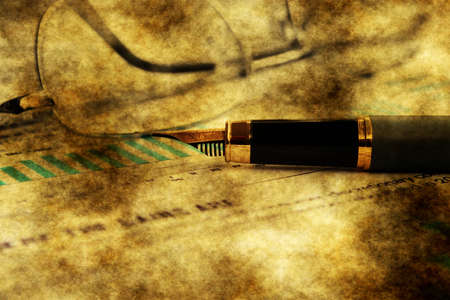 Fountain pen on financial reportの写真素材