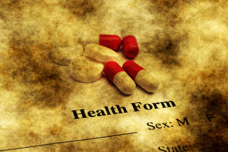 Pills on health form grunge conceptの写真素材