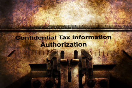 Tax information on vintage typewriterの写真素材