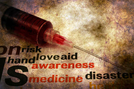 Syringe on health grunge conceptの写真素材