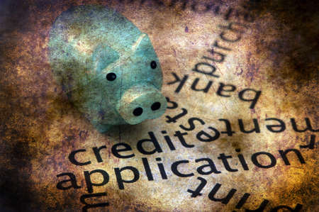 Piggy bank and credit grunge conceptの写真素材