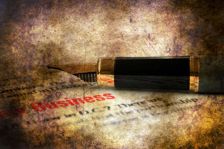 Fountain pen on business paperの写真素材