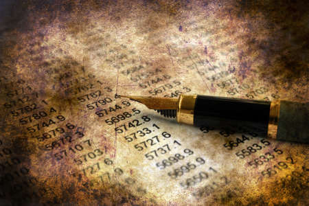 Pen on financial report grunge conceptの写真素材