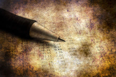 Pen on financial report grunge conceptの写真素材