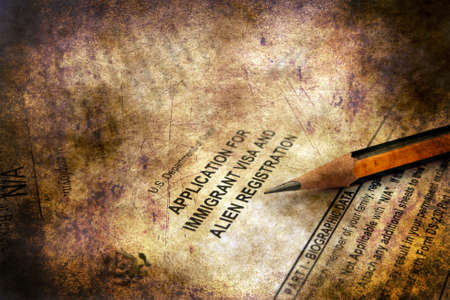 Application for immigrant visa grunge conceptの写真素材