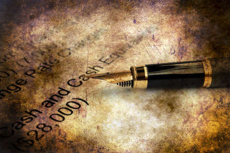 Financial report and fountain penの写真素材