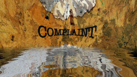 Complaint text on grunge background reflecting in water