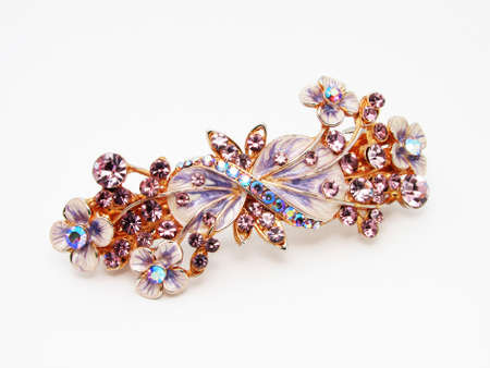 Antique brooch isolated on whiteの写真素材