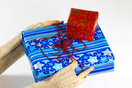 A pile of colorful Christmas gifts isolated on white backgroundの写真素材