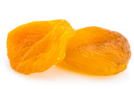 Dried apricots close-up on a white backgroundの写真素材
