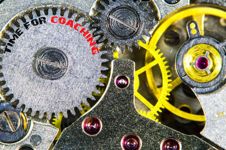 The clockwork old mechanical  high resolution with words Time for coaching