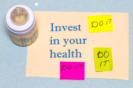 Invest in your health - the concept of a healthy lifestyle on blue background