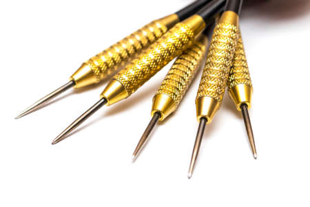 Darts arrows isolated on white background. Closeの写真素材