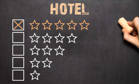 Best hotel five golden stars on Chalkboardの写真素材