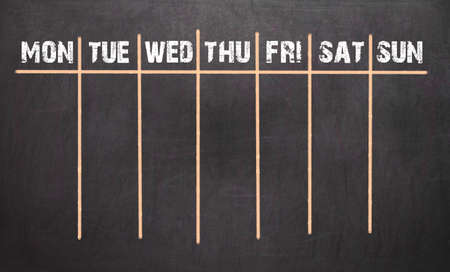 Weekly Calendar on chalkboard background. 7 day planの写真素材