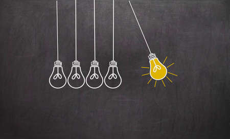 Great Idea. Creativity Concept with light bulbs on chalkboard backgroundの写真素材