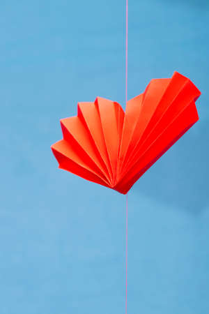 Symbol of love on sweet blue background, greeting card, Flat design Happy Valentines.の写真素材