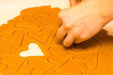 Making homemade christmas cookies in various shapes.の写真素材