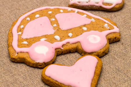 baby cookie on burlap in a heart shape.の写真素材