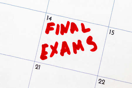 Calendar reminder, final exams,circled in red marker.