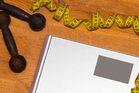 scale, jump rope, weights and tape measure, concept of diet and healthy lifestyle.