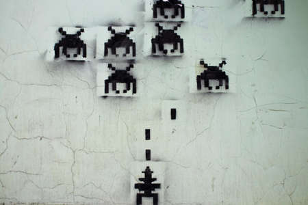 Old computer game painted on an old wall.