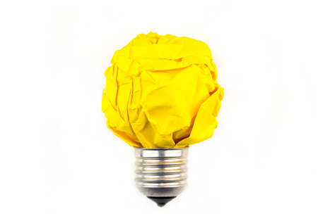 Inspiration concept crumpled paper light bulb metaphor for good idea.の写真素材
