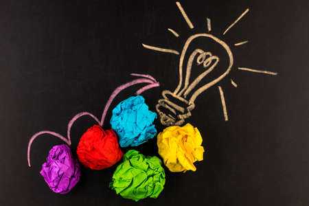 Great idea concept, crumpled paper on the chalkboard.の写真素材