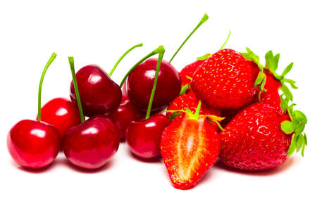 Background from fresh ripe strawberries and cherry.の写真素材