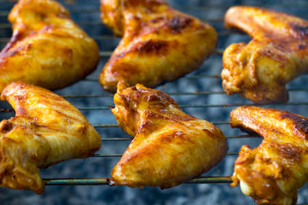 Hot chicken wings on baking tray.の写真素材