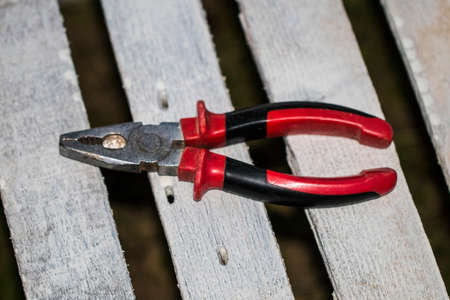 Dirty set of hand tools on old rusted sheet metal ,add your text on white background.の写真素材