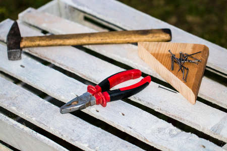 Dirty set of hand tools on old rusted sheet metal ,add your text on white background.の写真素材
