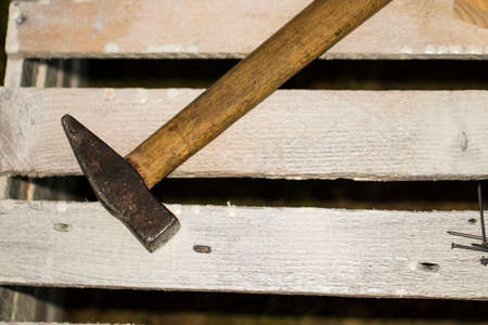Dirty set of hand tools on old rusted sheet metal ,add your text on white background.の写真素材
