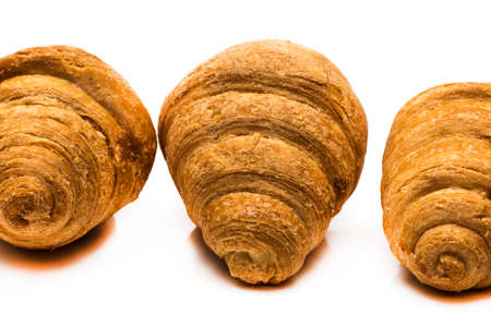 Fresh croissant isolated on white background. Home baking. Sweet.の写真素材