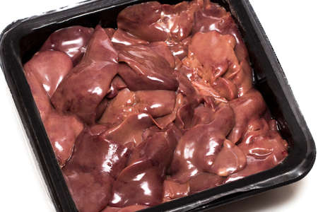 Fresh raw chicken liver in disposable packaging.の写真素材