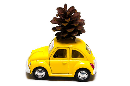 Christmas bump on toy retro car. Christmas holiday celebration concept.