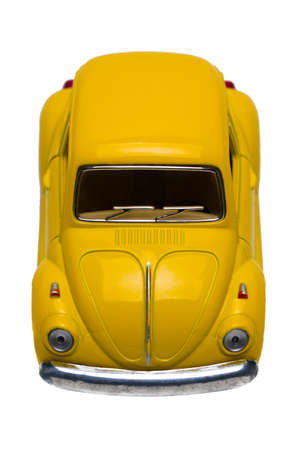 Yellow retro car isolated on white background.の写真素材
