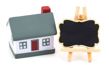Miniature model of house real estate for rent label on white background.の写真素材