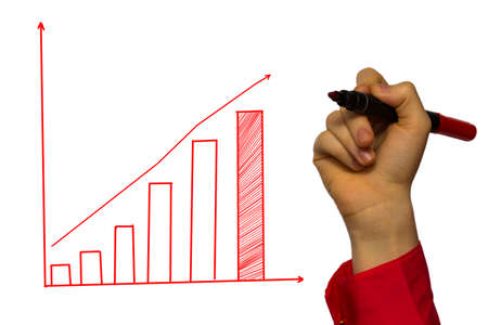 Hand of businessman drawing graphics a growing graph.の写真素材
