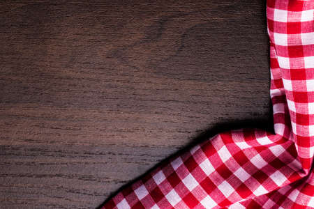 Napkin tablecloth on old wood with empty space for text.の写真素材