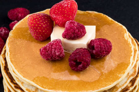  Pancakes with berry fruit and honey. Selective focus.の写真素材
