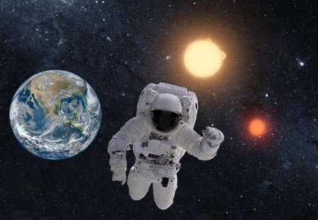 Astronaut in outer space over the planet earth.
