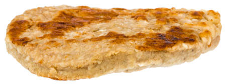 Single grilled hamburger patty isolated on white.の写真素材